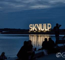 Skvulp lightsign reflecting in the sea